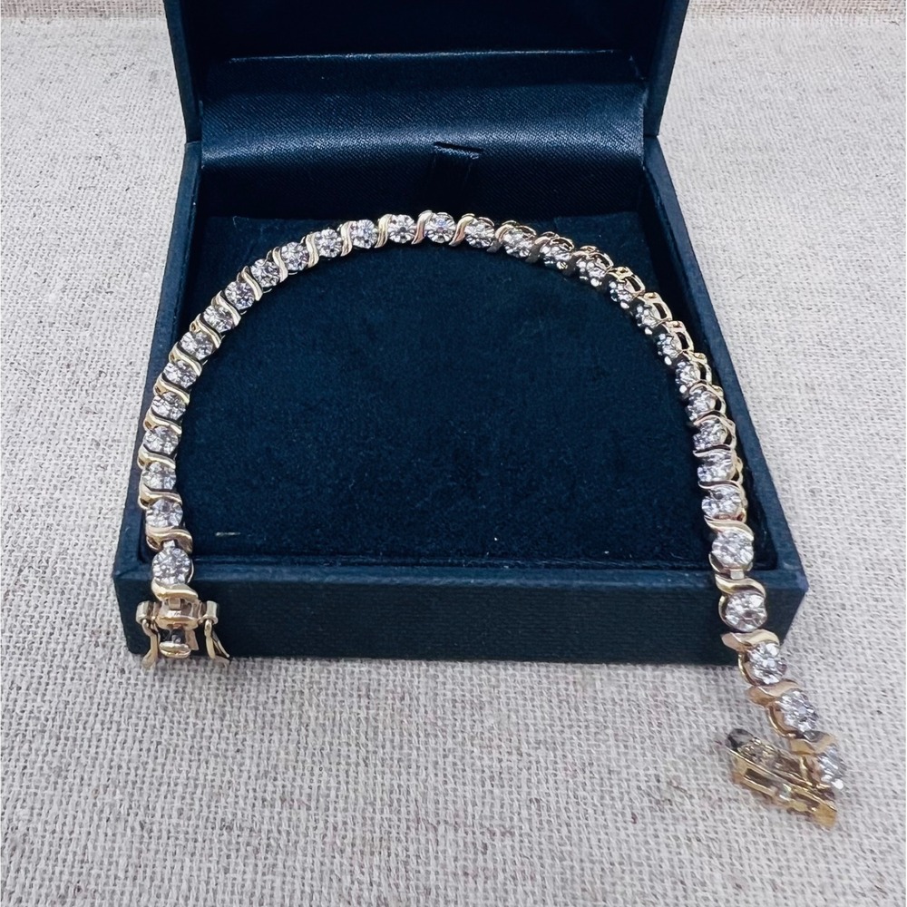 Gold Over Sterling Silver S-Link Round Cut Accents Tennis Bracelet